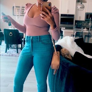 Wild Fable one piece long sleeve bodysuit with pouf shoulders.